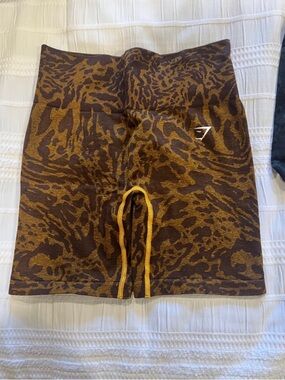Gymshark women’s Brown & Gold Animal-Print Athletic Shorts